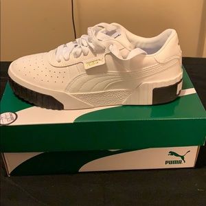White and black puma gym shoes